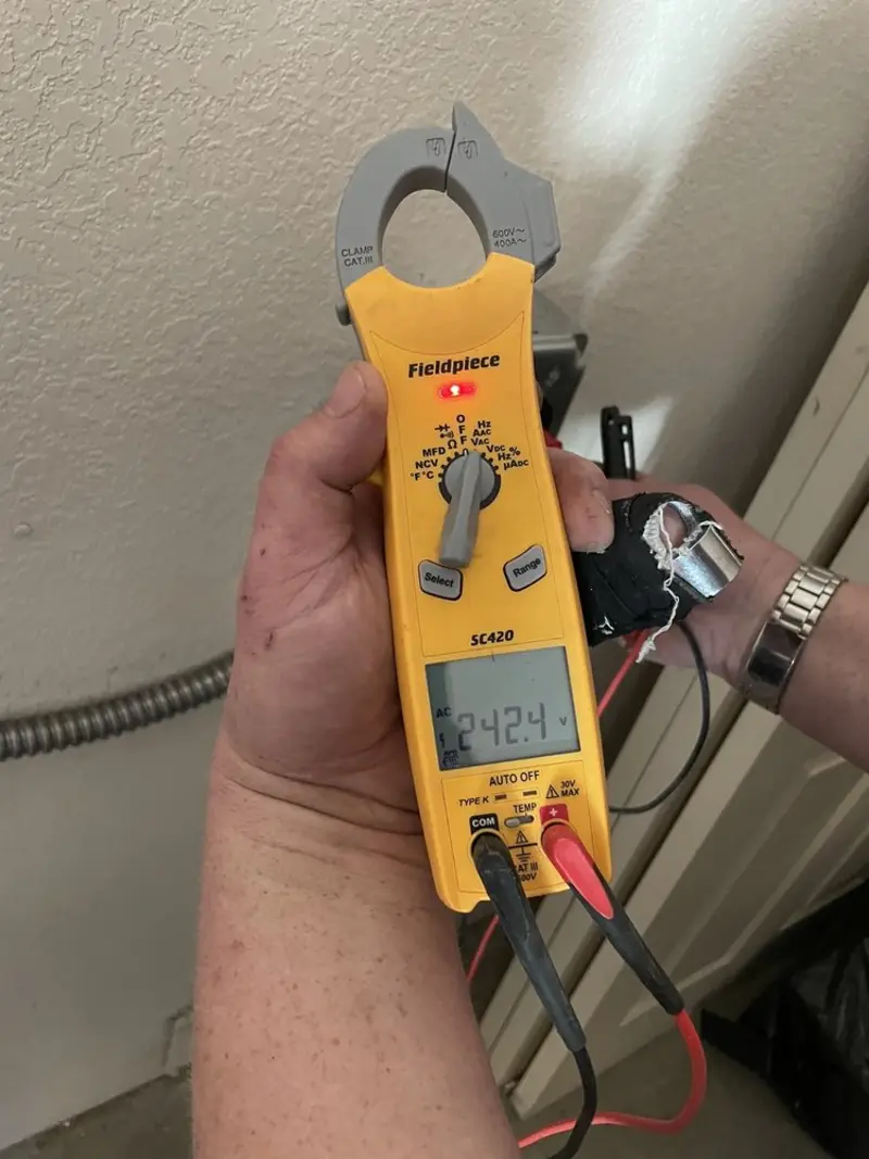 Voltage testing with clamp meter during Circuit Breaker Repair in Muskego